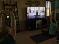 46-Mommy_joins_Kenny_in_some_YouTube_yoga-another_coach_suggestion_to_improve_swimming_performance