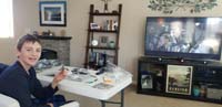 56-Kenny_builds_the_Mandalorian_Razor_Crest_ship_while_watching_Mandalorian