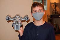 57-Kenny_shows_Daddy_completed_Lego-wears_mask_since_Daddy_in_isolation_due_to_MN_trip