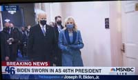 22-he_is_now_the_46th_President_of_the_United_States-nuclear_football_military_officer_behind_him