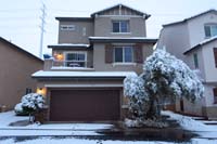 32-front_of_the_house-still_snowing