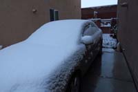33-Daddy's_car_is_covered_with_snow