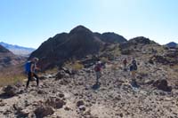 06-group_heading_up_a_ridgeline_after_checking_out_desilting_tank_and_pipes_to_Boulder_City