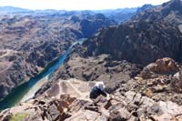 14-Kenny_relaxes_on_the_peak_eating_lunch_enjoying_the_views-sure_does_look_like_he's_on_a_cliff,but_not