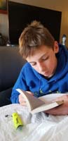 17-reading_for_school-he_did_miss_a_couple_tests_though,they'll_be_dropped