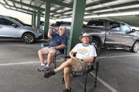 077-Daddy_hangs_out_with_Grandpa_Duke_in_the_parking_lot_under_the_shade