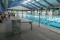 080-another_group_stages_at_this_point_before_moving_to_end_of_pool_opposite_of_starting_blocks
