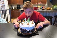 15-goofy_Kenny_is_ready_to_eat_the_entire_cake