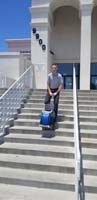 03-Kenny's_last_time_dragging_his_Zuca_down_the_steps