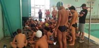 25-swim_team_takes_a_break_from_practice_to_watch_teammate_at_Olympic_Trials