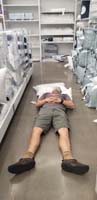 40-Daddy_testing_out_pillows_in_Bed_Bath_and_Beyond