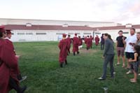 64-class_walking_away_as_graduates