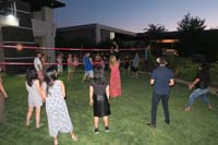 27-volleyball_fun_continues_into_the_evening,but_this_time_the_adults_join_in