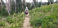 30-Kenny_and_wildflowers_along_the_trail