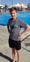 30-Kenny_and_his_1st_place_medal_for_1500m_freestyle-Charles_provided_good_luck