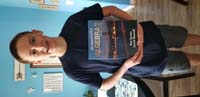 29-Kenny_shows_off_his_Algebra_2_honors_book-he_so_happy,but_who's_the_smart_one,the_boy_or