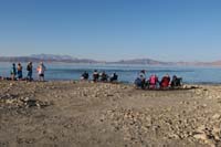 69-away_they_go,many_parents_hang_out_by_the_water_in_the_heat