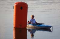 15-an_official_in_position_at_a_buoy_ready_for_the_race_to_start