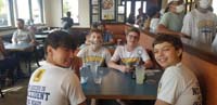 05-after_practice_lunch_in_a_restaurant_during_a_pandemic-masks_for_line,but_no_mask_when_sitting_at_a_table-1030am