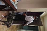 40-Kenny_enjoys_greeting_the_trick_or_treaters,Rainier_likes_to_help