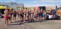 12-Kenny_in_middle_in_green_cap_and_other_swimmers_waiting_for_their_turn_to_start_the_race