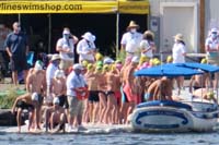 15-zoom_view_from_spectator_area,Kenny_is_green_cap_in_middle,Mommy_is_left_most_white_shirt