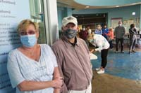 47-Grammy_and_Grandpa_Duke_waiting_in_the_lobby_for_our_turn_to_enter_the_pool_for_the_next_race