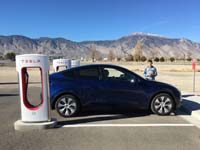 001-charging_the_Tesla_in_Hawthorne,NV_with_Mt_Grant_in_background