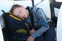 002-when_he_sleeps_on_his_swim_bag_on_the_drive_to_States,what_event_does_he_dream_about