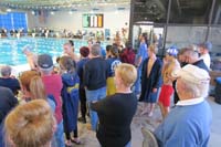076-we_have_to_crowd_around_waiting_for_room_to_view_our_event