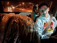 05-Kenny_and_the_Christmas_tree_on_the_drive_home-using_the_4Runner,not_the_Tesla