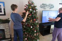 10-decorating_the_tree_while_watching_'The_Christmas_Chronicles'_on_Netflix