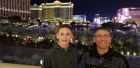 25-Kenny_and_slouching_Daddy_leaning_against_the_railing