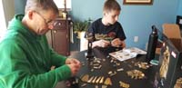 58-Daddy_sorts_pieces_while_Kenny_builds_Thanos'_Infinity_Gauntlet