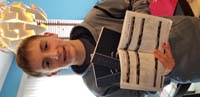 65-Kenny_shows_off_his_swim_log_books_for_2021,he_swam_1,411,750_yards_or_over_802_miles-WOW