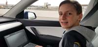 01-taking_a_test_on_the_drive_to_the_out_of_town_swim_meet