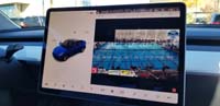 15-Day_3-Mommy_watches_the_live_streamed_race_from_the_Tesla_since_limited_visitation_inside_the_building_for_this_meet_unlike_States