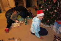 07-opening_presents_after_Kenny_distributes