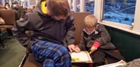 28-Kenny_helping_Luke_with_his_letter_to_Santa