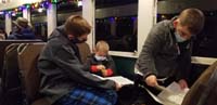 50-Kenny_helps_Luke_and_Wade_finish_their_letters_to_Santa