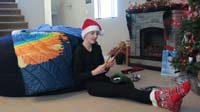 06-Kenny_opens_gifts_in_his_stocking