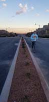 11-Kenny's_dedication-running_sprints_up_the_hill_on_the_street_next_to_our_house