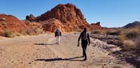06-Daddy_leading_the_way_while_Kenny_carries_his_stash_of_rocks
