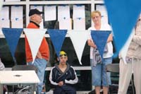 27-relaxing_and_waiting_for_his_turn_to_race,7pm