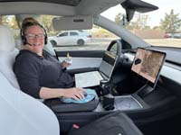 11-Mommy_setup_to_work_in_the_Tesla_while_Daddy_enjoys_a_colonoscopy