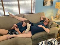 10-Mommy_and_Kenny_laying_on_the_couch_watching_TV